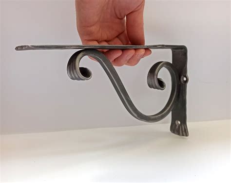 simple metal shelf brackets iron|wrought iron brackets for shelves.